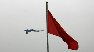 China's air force gets a lift with pilot's promotion to top military job