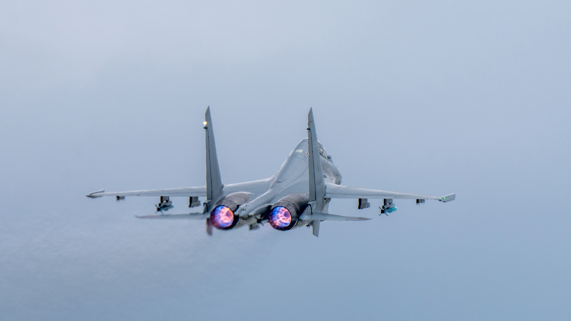 J-16 fighter jets engage in training