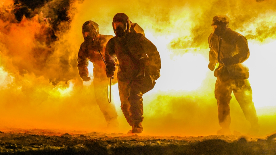 Chemical defense troops train at night