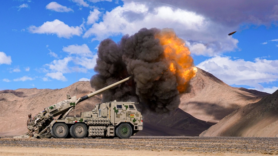 Multi-type artilleries spit fire at targets