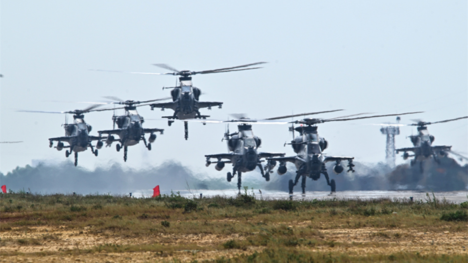 Multi-type helicopters engage in formation flight training