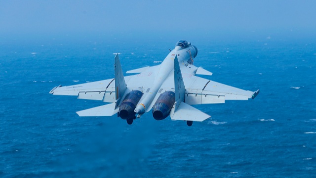J-15 carrier-based fighter jets in flight training
