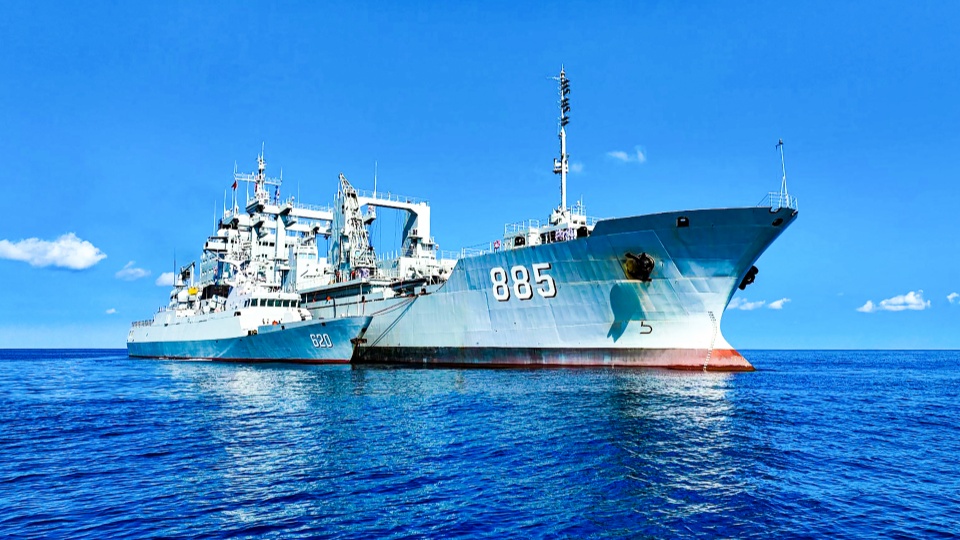 Warships conduct replenishment at sea