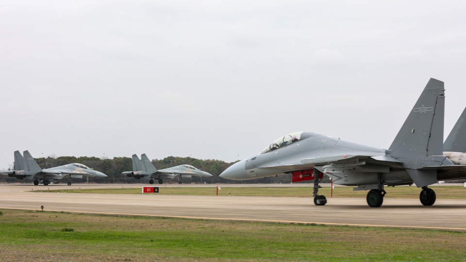 J-16 multi-role fighter jets participate in training