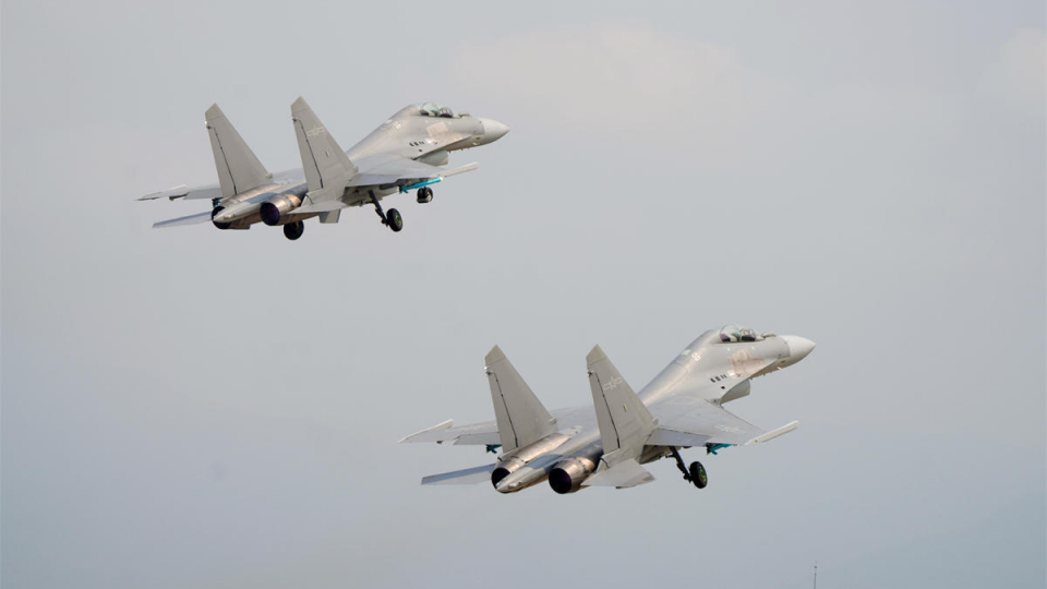 J-16 fighter jets engage in training
