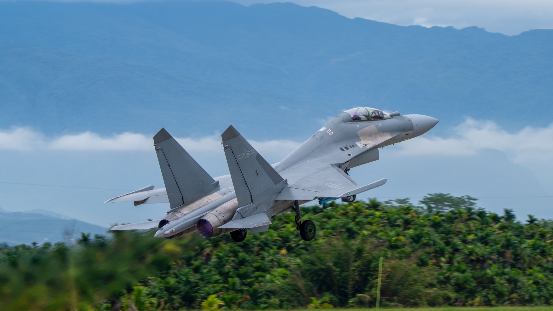 J-16 fighter jets engage in training