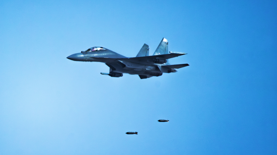J-16 fighter jets fire at ground targets