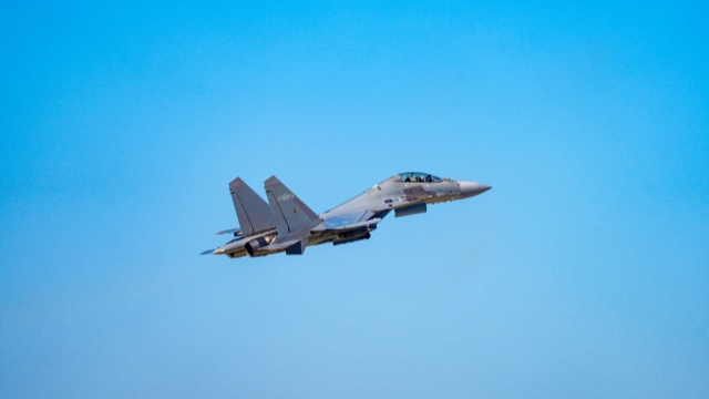 J-16 fighter jet soars into sky