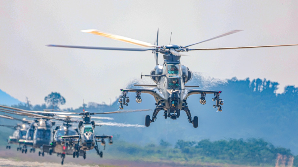 Multi-type helicopters lift off for flight training
