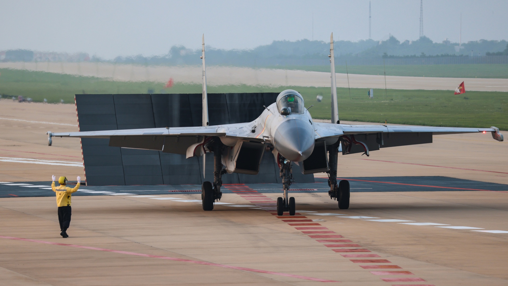 PLA Naval Aviation University conducts carrier-based aircraft launch and recovery drill