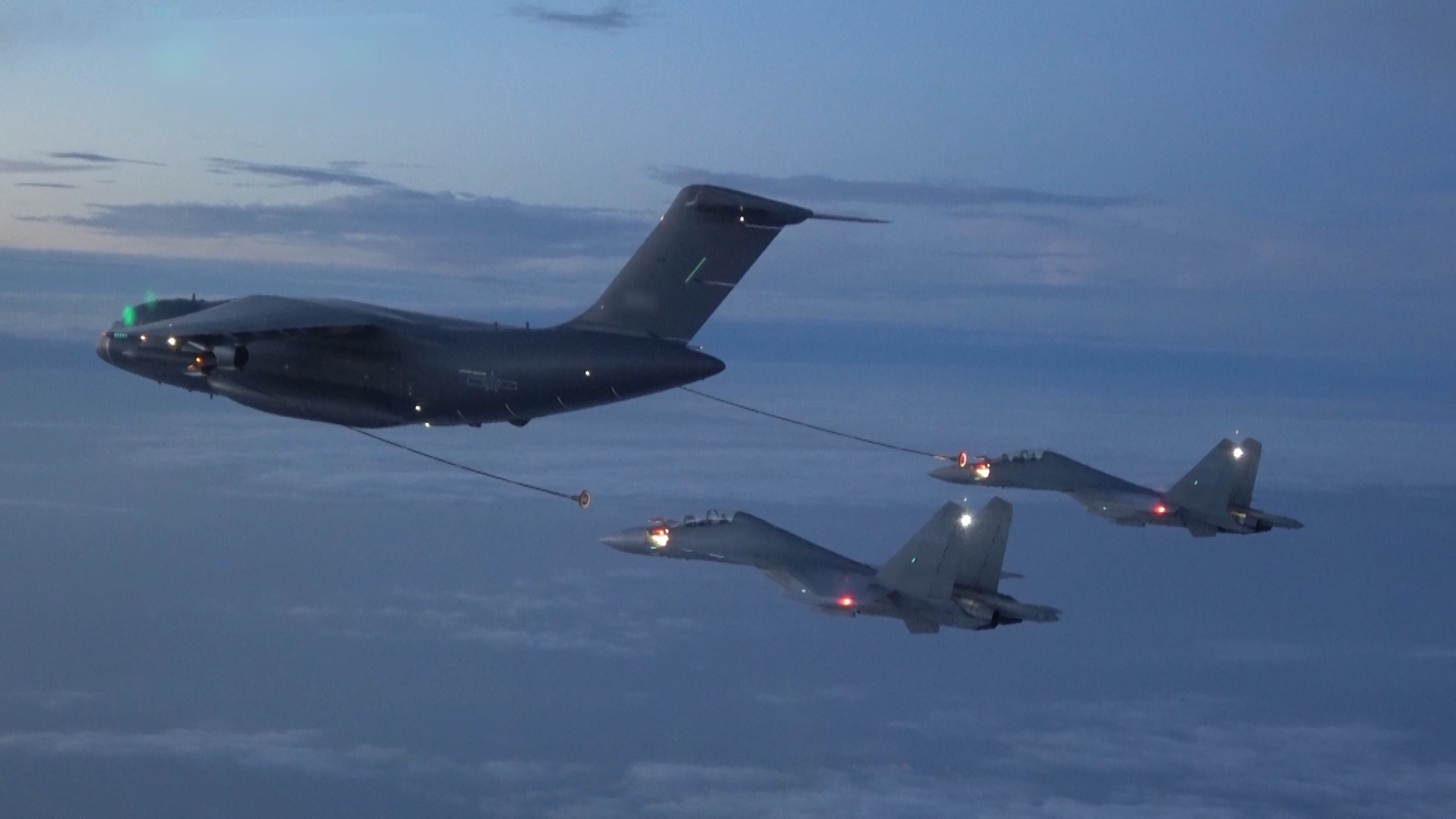 J-16 fighter jets conduct aerial refueling training