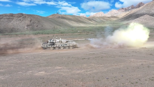 Tanks conduct round-the-clock live-fire shooting