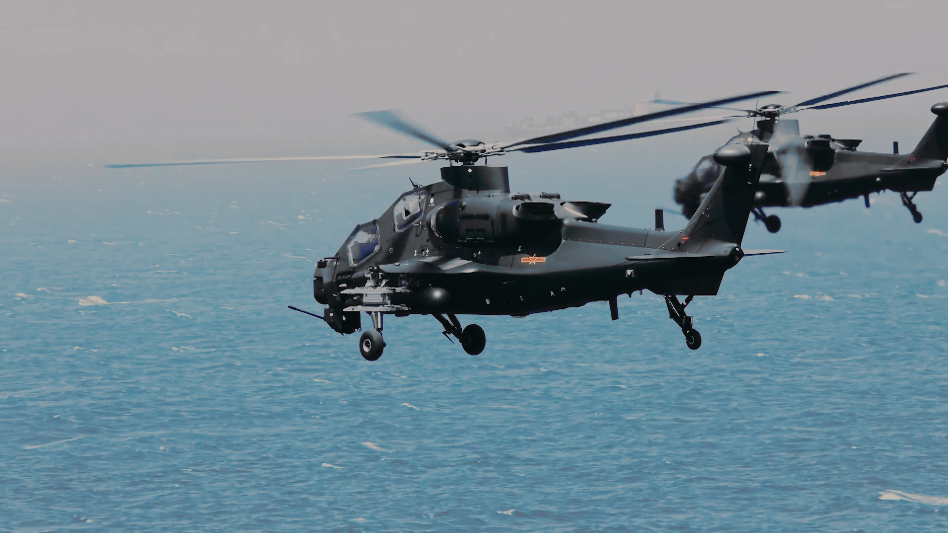 Multi-Model Army Helicopters Conduct Over-Water Flight Training