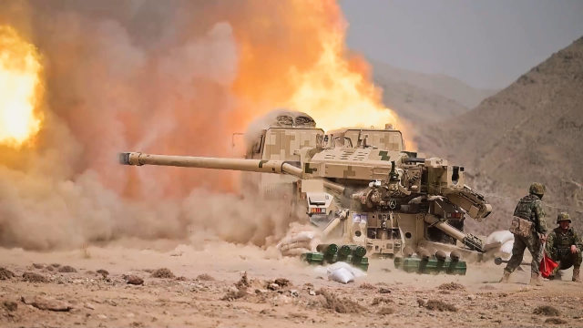 Wheeled Self-propelled Howitzers Roar in Gobi Desert