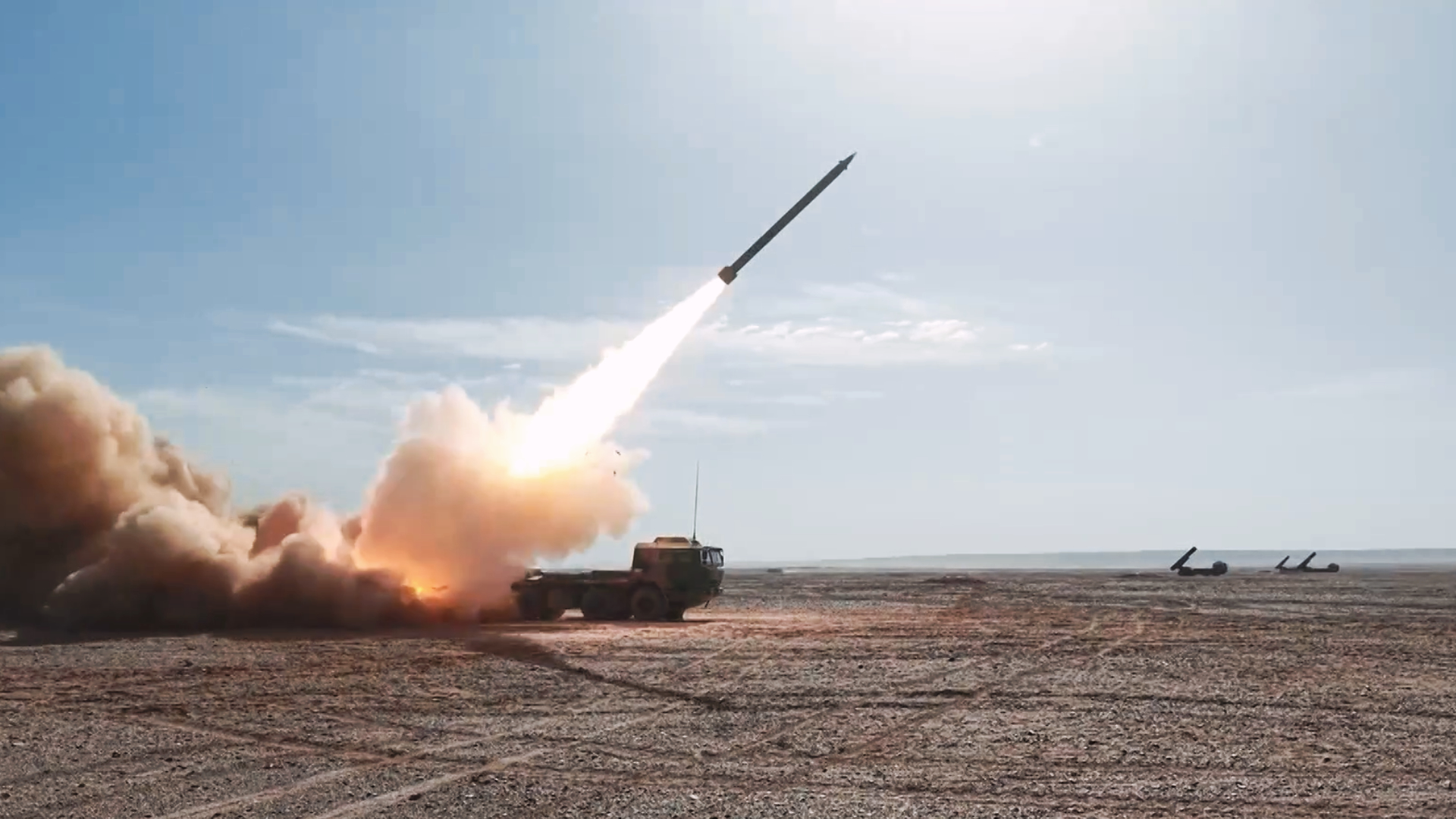 Long-range Rocket Artillery Troops Conduct Live-fire Exercise
