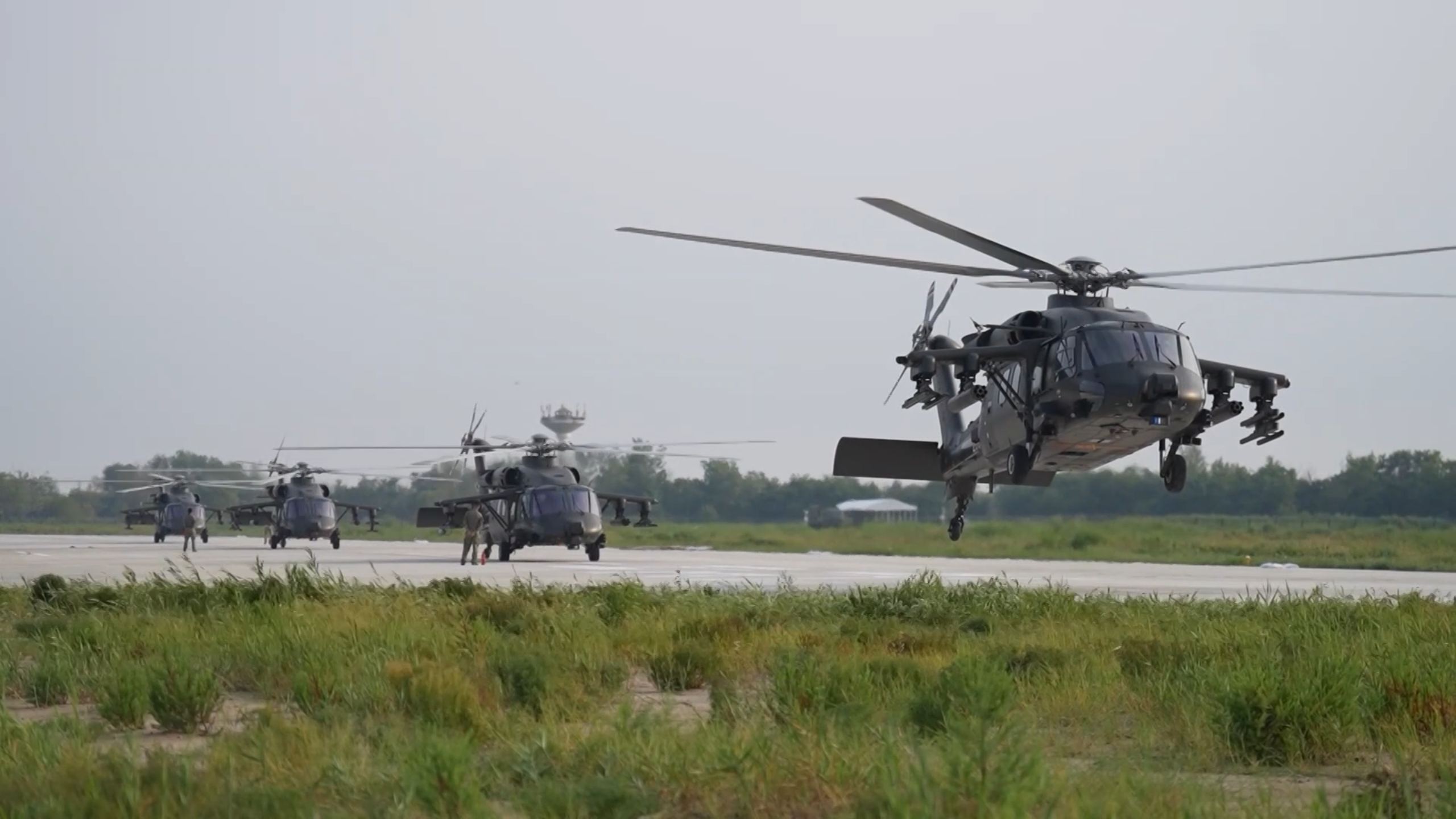 Multi-Type Choppers Practice Shooting Above Sea