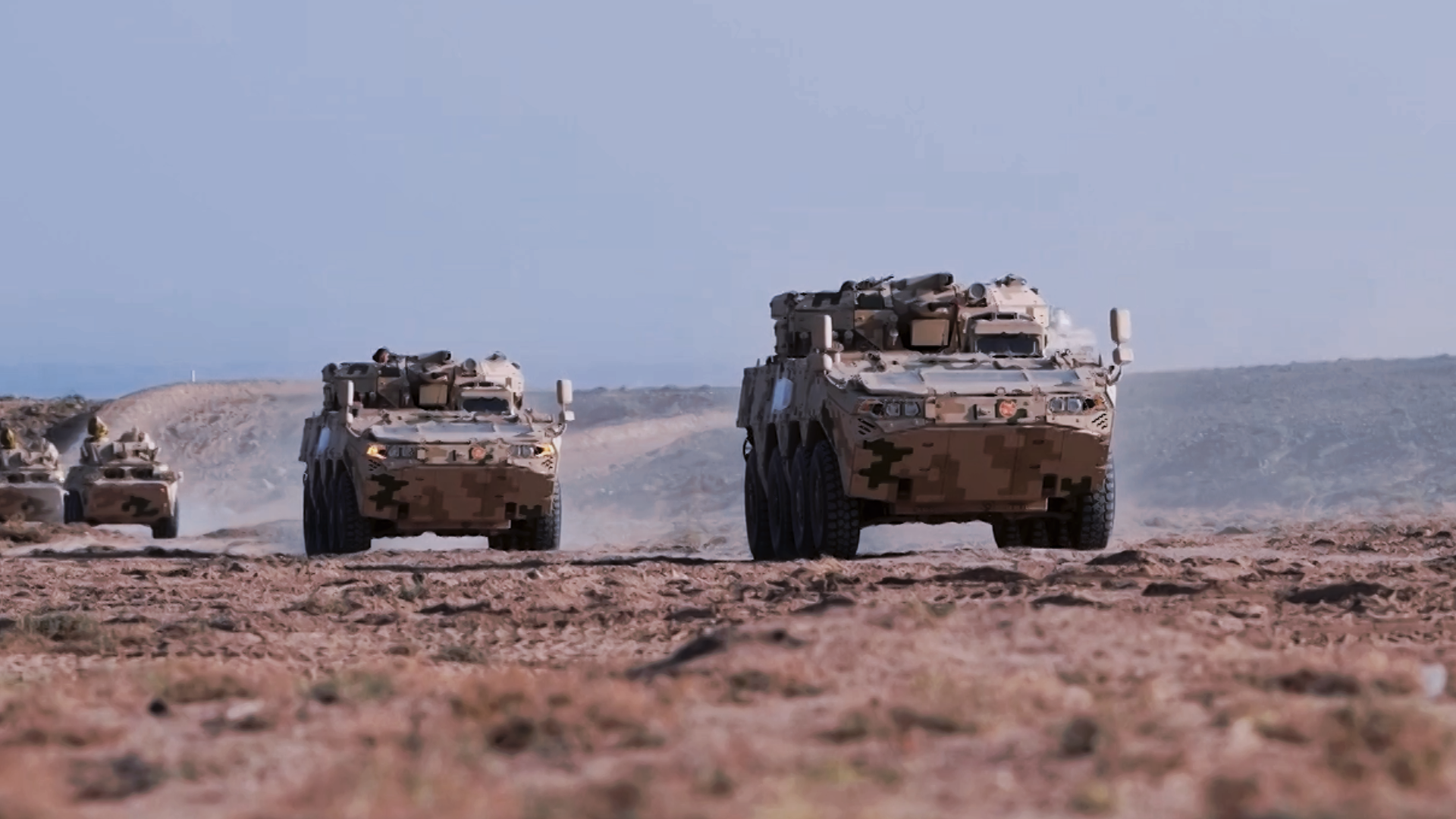 New 8x8 Wheeled Armored Vehicles Engage in Combat Training