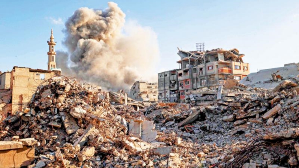 Israel launches fresh strikes on Gaza, halts humanitarian aid