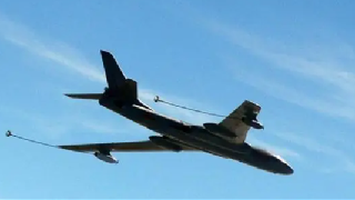 HY-6 tankers take off in the rain 
