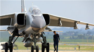 Fighter bombers taxi in formation before takeoff