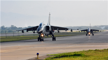 JH-7 fighter bombers in flight mission