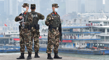 Nearly 200,000 armed policemen stick to posts on Chinese New Year's Eve