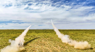 Air-defense missiles tear through the sky