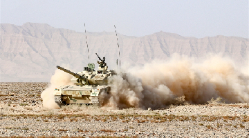 Type 15 Lightweight Tanks churn up a storm of dust