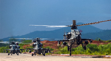 Attack helicopters lift off for flight training