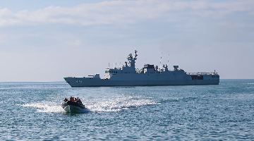 Chinese naval frigates in maritime combat training