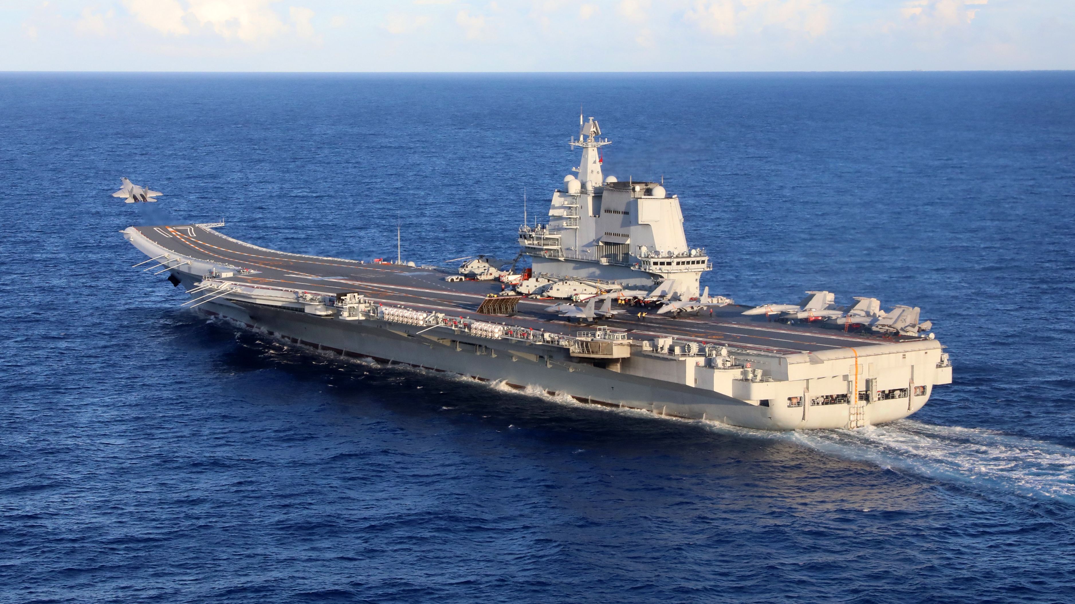 PLA Navy aircraft carriers conduct training in the Western Pacific