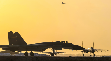 Fighter jets engage in real-combat flight training