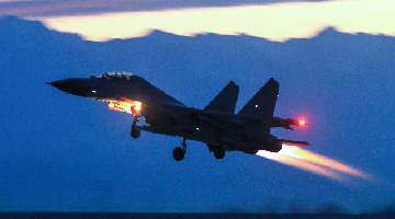 Fighter jet takes off at sunset during round-the-clock training