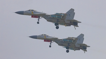 J-15 carrier-based jets conduct flight training