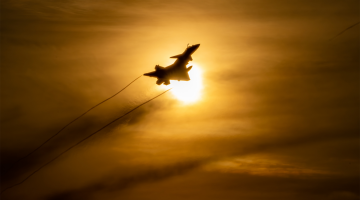 J-10 fighters take off at sunrise