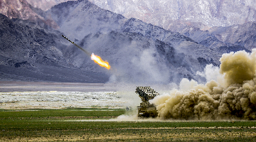 Vehicle-mounted rocket launcher fires at mock targets