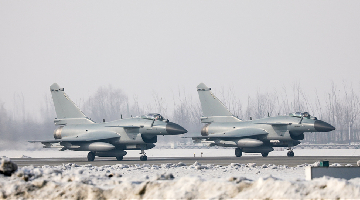 Fighter jets taxi on runway after snow