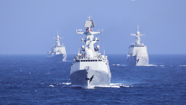 Naval vessels engage in real-combat training