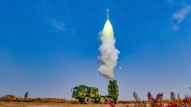 Air defense missile system engages in live-fire training
