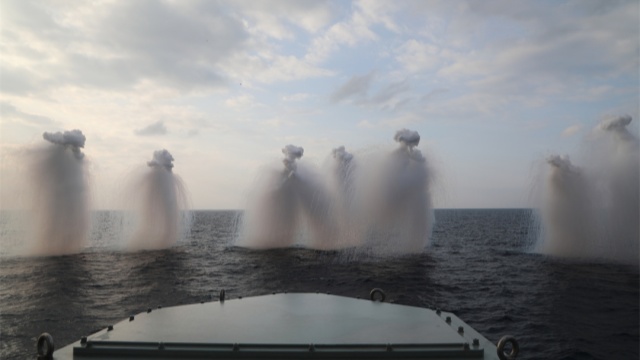 Frigate launches jamming bombs