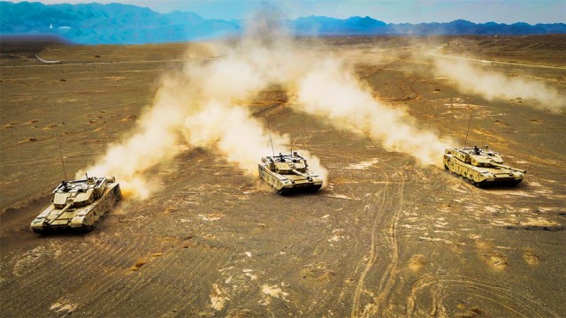 Type-99A tanks engage in combat training