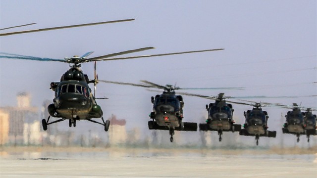 Helicopters hover at ultra-low altitude
