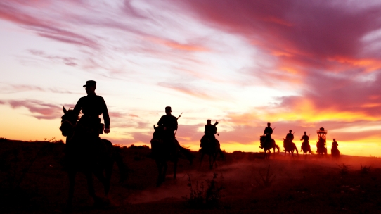 Border defenders patrol by riding horses