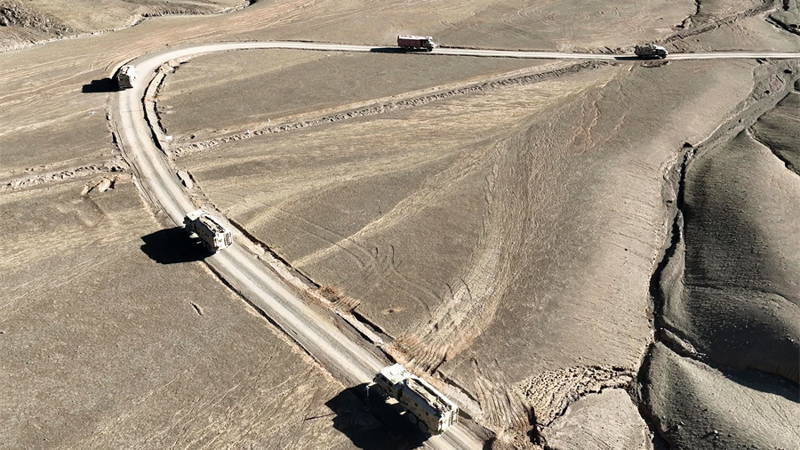 Military vehicles en route to designated area