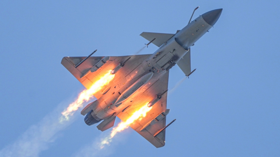 J-10 fighter jet fires at ground target