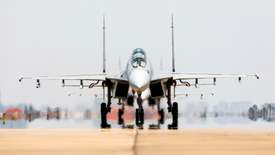 J-16 fighter jets in flight training
