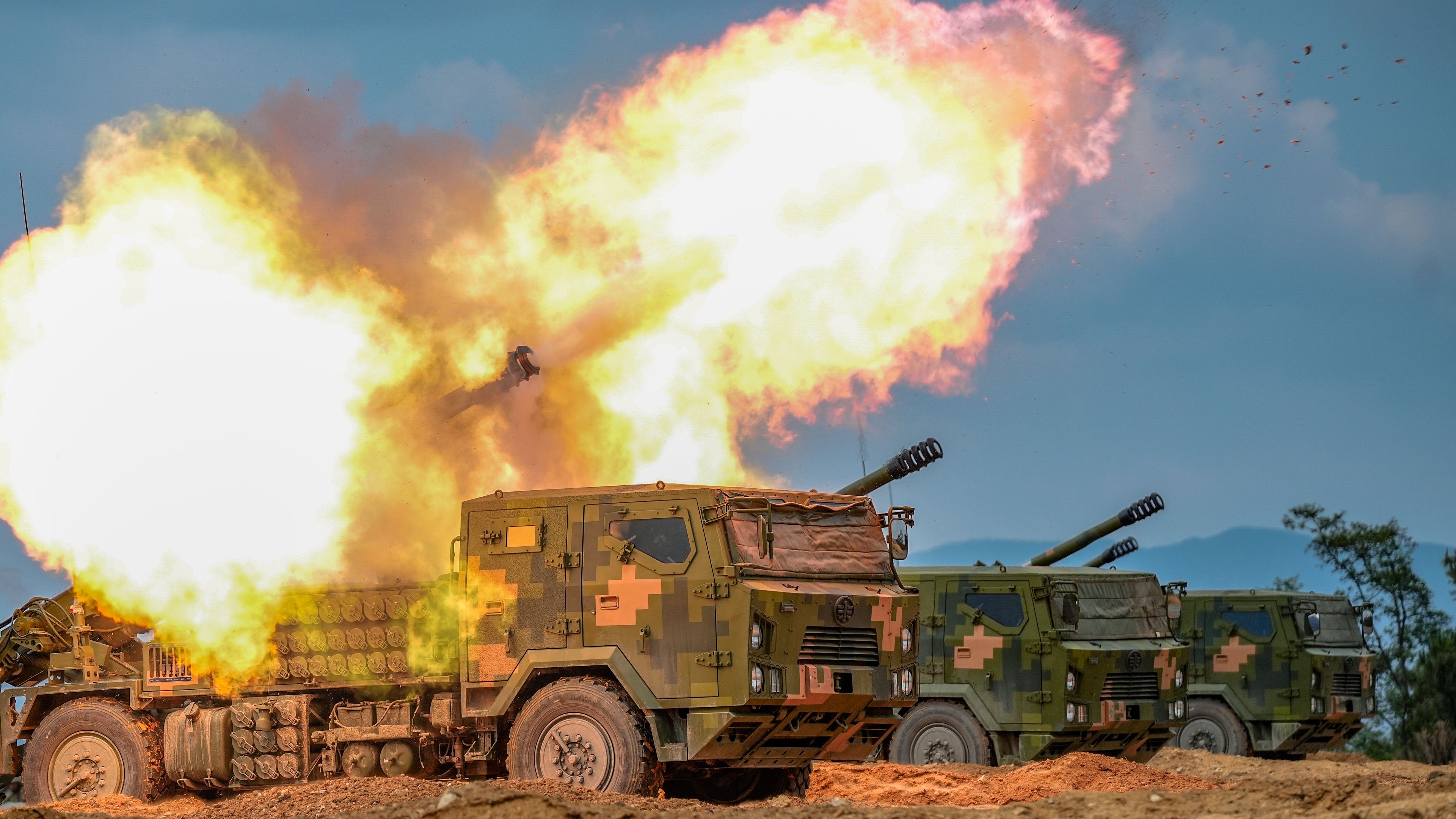 Howitzer systems fire at mock targets