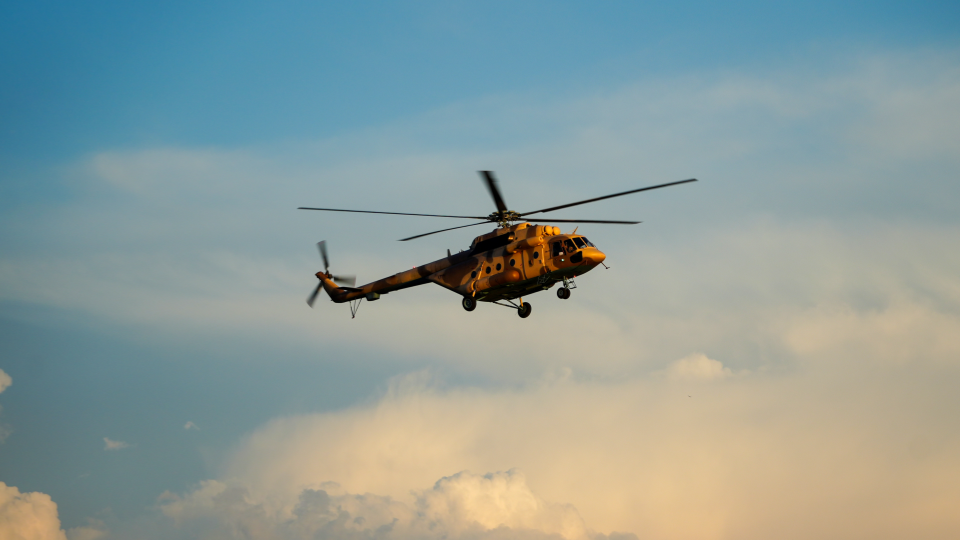 Multi-type helicopters engage in flight training