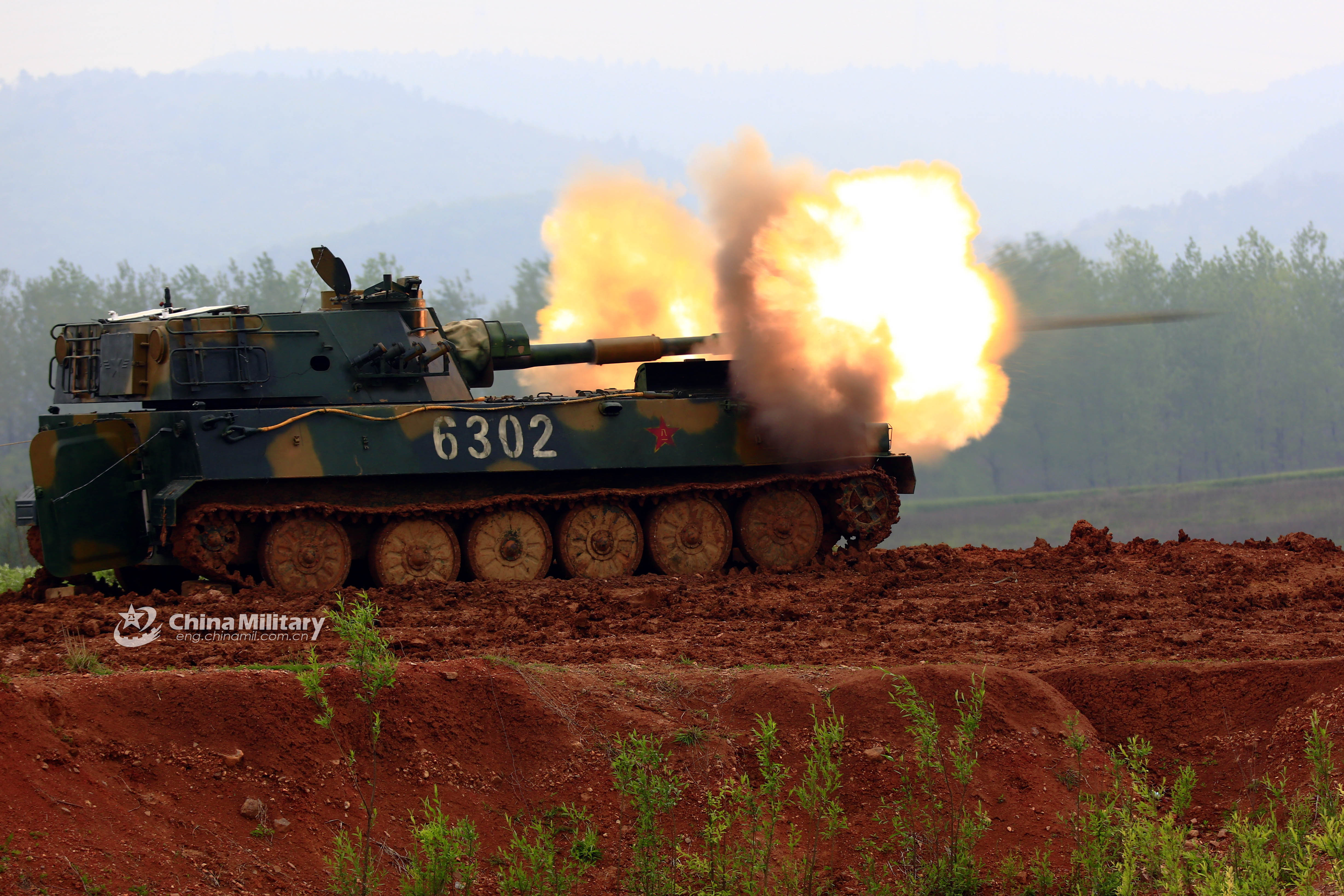 Self Propelled Howitzer System Fires At Mock Target Photos China