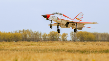 Jet trainer in field carrier landing practice 